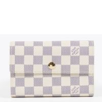 LOUIS VUITTON PORTEFEUILLE Alexandra en cuir grainé damier azur, chiffré C.L.R à l'intérieur (env 15 x 10 x 3 cm). Etat neuf
