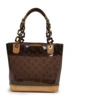 LOUIS VUITTON (Collection Cruise, édition limitée) (2003) SAC Cabas Ambre petit modèle en vinyle transparent monogrammé et cuir naturel, garnitures en laiton doré et plexiglass façon écaille (env 24 x 23 x 11 cm). Patine d'usage, marques