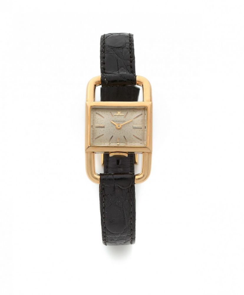 JAEGER LECOULTRE pour HERMÈS,Étrier, ref. 1670, n° 176640,Vers 1963,Montre bracelet de dame en or jaune 18k (750),Boîtier: carré, anses style Étrier, couronne de remontoir à 6h, numéroté et signé Hermès Paris,Cadran: argenté, index bâton, signé,Mouvement: