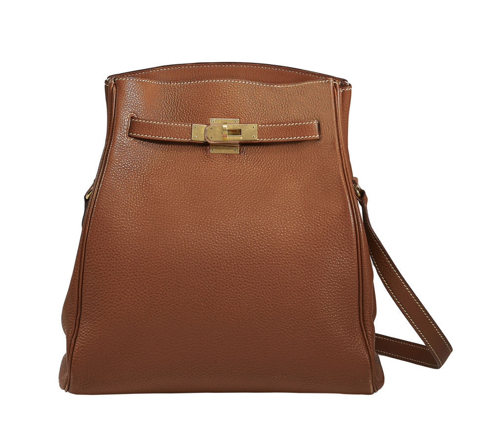 2001
       Sac KELLY SPORT Veau grainé Gold  Garniture métal plaqué or  Piqué sellier blanc  Dimensions : 25...