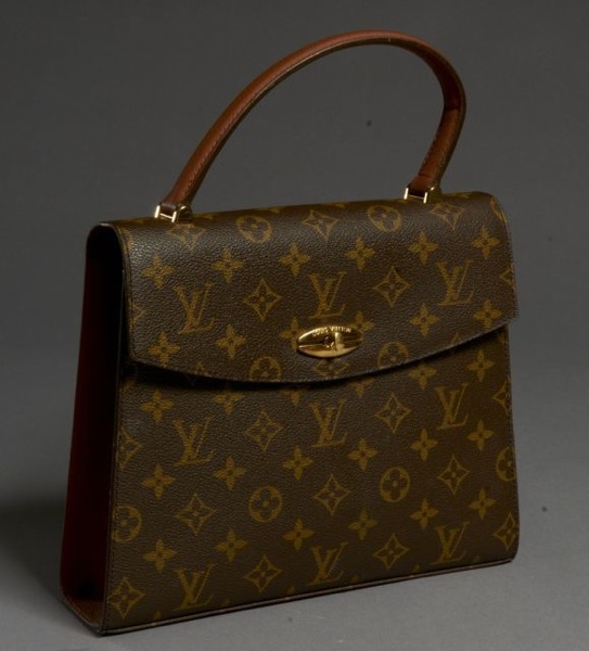Louis VUITTON Malsherbes en toile monogram. Très bon état