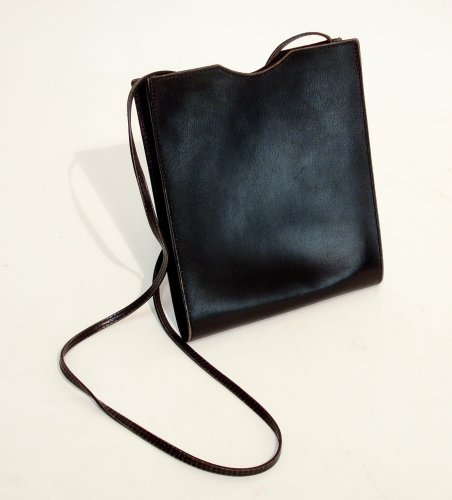 HERMES Paris Pochette Onimetou en box noir, anse bandouli