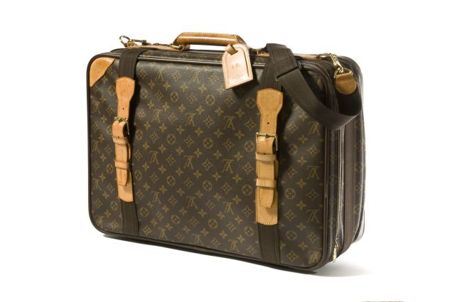 LOUIS VUITTON VALISE Satellite semi souple en toile Monogram, et cuir naturel, garnitures en laiton dor