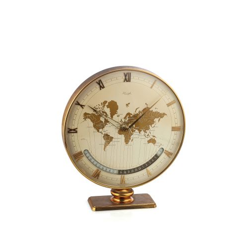 KIENZLE WORLD TIME CLOCK. Kienzle, Germany. Made in the 1960s. Large world time. 8-day going desk / mantel clock with 24-hour day and. night indication.