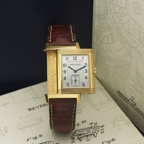 JAEGER LECOULTRE REF. 270.1.54 NIGHT-DAY REVERSO. Jaeger LeCoultre, "Reverso Duo Face Night Day" case No. 1870873. Ref. 270.1.54. Made circa 2000.. Very fine, rectangular, 2 individually adjustable time zones, double. dial, 18k yellow gold reversible wris