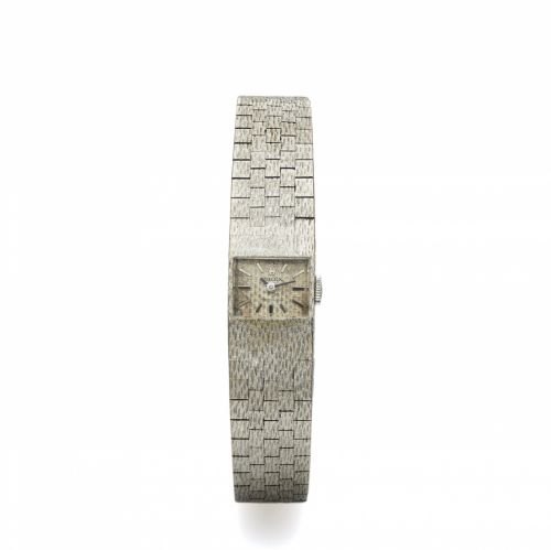 ROLEX REF. 2613 WHITE GOLD LADY'S. Rolex, Precision, Ref. 2613. Made in the 1960s.. Fine, rectangular, 18K white gold lady's wristwatch with a. textured integral white gold bracelet.