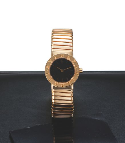 BVLGARI REF. BB 23 2T TUBOGAS YELLOW GOLD. Bvlgari, case No. P.91740, Ref. BB 23 2T.. Made in the 1990's.. Fine and elegant, 18K yellow gold quartz lady's. wristwatch with integrated 18K yellow gold Bvlgari. bracelet. Accompanied by a box and guarantee.