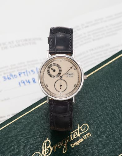 BREGUET REF. 3690 LIMITED EDITION PLATINUM. Breguet, No. 57/75, No. 10159, case No. 1948H, Ref. 3690.. Made in a limited series of 75 pieces in 1996.. Very fine and rare, manual-winding, platinum wristwatch with "regulator dial" and a platinum Breguet buc