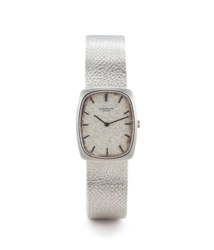 PATEK PHILIPPE REF. 3567 WHITE GOLD. Philippe, Genève, No. 1173608, case No. 2726139, Ref. 3567/1. Made circa 1960s.. Fine and rare, tonneau-shaped, thin, 18K white gold. wristwatch with an 18K white gold Patek Philippe hammered. mesh bracelet.