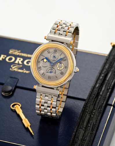 FORGET CHRONOMETRE STAINLESS STEEL AND GOLD.Forget Chronomètre, No. H 023, Ref H 002. Produced in the 1990's..Fine, astronomic, center-seconds, self-winding, water resistant, stainless steel and.gold wristwatch with day, date, moon phases, power reserve a