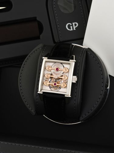 GIRARD PERREGAUX, AUTOMATIC THREE BRIDGES TOURBILLON PLATINUM.Girard-Perregaux, No. 34 Pt, Ref. 9987. Made in 2006..Very fine and rare, square, platinum, self-winding wristwatch with three gold bridges, visible one-minute.tourbillon regulator and an 18K w