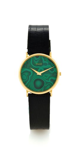 PIAGET REF. 9025 TRADITION YELLOW GOLD.Piaget, Genève, Tradition, case No. 168810, Ref. 9025. Made in 1990..Fine and elegant, thin, 18K yellow gold wristwatch with malachite.dial and an 18k Piaget buckle.