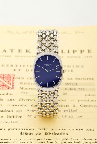 PATEK PHILIPPE REF 3577, GOLDEN ELLIPSE, ORIGINAL CERTIFICATE.Patek Philippe, Genève, Ellipse, No. 1168755, Ref. 3577-1. Made in the 1970s..Very fine, oval, 18K white gold gentleman's wristwatch with an integrated 18K.white gold Patek Philippe articulated
