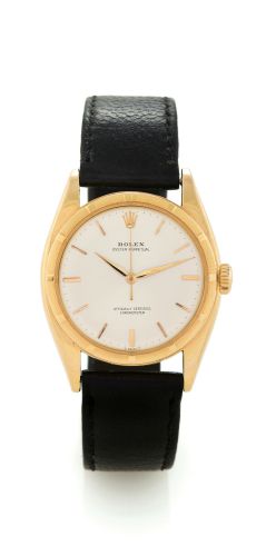 ROLEX REF 6099.Rolex, Oyster Perpetual, Officially Certified Chronometer.case No. 791621, Ref. 6099. Made in 1951..Fine and very rare, tonneau-shaped, water-resistant, center-.seconds, self-winding, 18K yellow gold wristwatch with a gold.plated Rolex buck