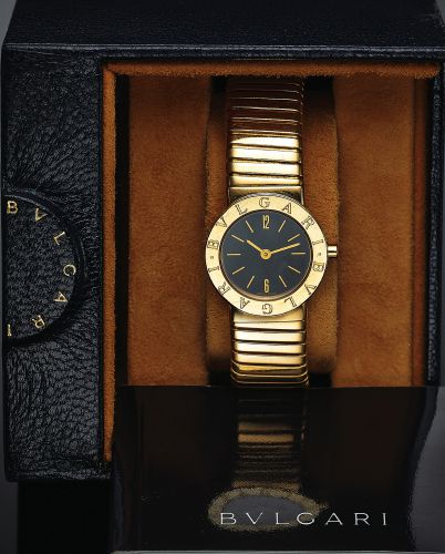 BULGARI REF. BB 23 2T YELLOW GOLD LADY'S.Bulgari, Ref. BB 23 2T. Made in 1992, sold.November 11th, 1993..Fine, water-resistant, 18K yellow gold lady's quartz.wristwatch with an integrated 18K yellow gold Bulgari.Tubogaz bangle bracelet. Accompanied by the