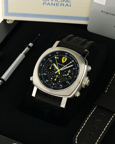 FERRARI BY PANERAI RATTRAPANTE STEEL.Ferrari, Engineered by Officine Panerai, Rattrapante, No. F B200 / 500.case No. BB 1232103, Ref. F 6657. Made in a limited series of 500 pieces.in 2006, sold March 7, 2009..Fine, cushion-shaped, large, water-resistant,