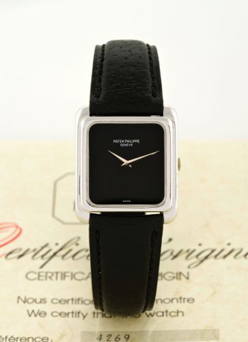 PATEK PHILIPEE REF. 4269, ONYX DIAL, WHITE GOLD.Patek Philippe, Genève, No. 1413285, Ref. 4269. Made in July 1987..Fine, thin, carré galbé, 18K white gold square wristwatch with a Patek Philippe 18k.white gold buckle. Accompanied by the original certifica