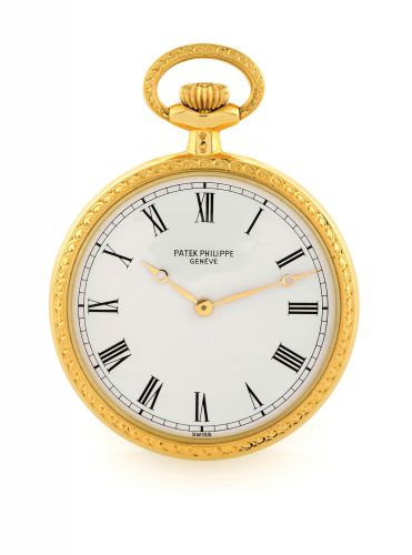PATEK PHILIPPE, REF. 917/14, YELLOW GOLD PENDANT WATCH.Patek Philippe, Geneve, No. 1335133, case No. 2816361. Ref. 917/14..Made circa 1983..Very fine, rare and elegant, 18K yellow gold keyless lady's pendant watch.