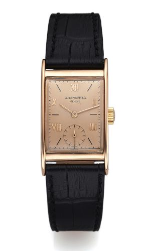 PATEK PHILIPPE REF. 1588 - PINK GOLD.Patek Philippe & Co, Genève, movement No. 837323.case No. 638588, Ref. 1588. Made in 1944..Very fine and rare, rectangular curved, 18K pink.gold wristwatch.