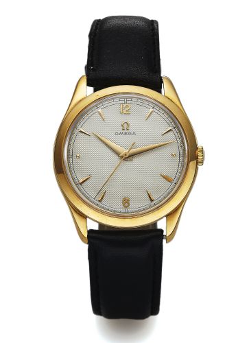 OMEGA REF. 2624 HONEYCOMB DIAL YELLOW GOLD.Omega, No. 12464496, case No. 11095066, Ref. 2624..Made in the late 1950s..Fine and rare, center seconds, manual winding, 18K yellow gold.wristwatch with honeycomb dial and a gold-plated Omega.buckle.