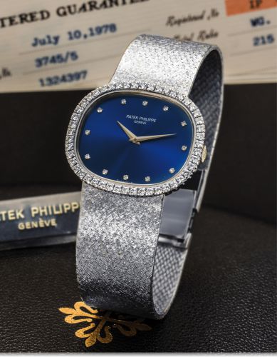PATEK PHILIPPE REF. 3745/005 WHITE GOLD AND.DIAMOND.Patek Philippe, Genève, No. 1324397, Ref. 3745/005. Made in 1970s..Very fine and elegant, oval, 18K white gold hand-winding mid-sized wristwatch with diamond set bezel and.dial on an 18K white gold Patek