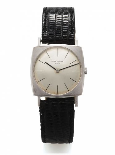 PATEK PHILIPPE REF. 3523 WHITE GOLD.Patek Philippe & Co., Genève, No. 1171940, case No. 2659585.Ref. 3523. Made circa 1970s..Fine and rare, cushion-shaped, flat, 18K white gold wristwatch.