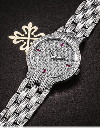 PATEK PHILIPE REF, 3965/1 WHITE GOLD AND.DIAMOND.Patek Philippe & Cie, Genève, No. 1816376, Ref. 3965/1. Made circa 1980's..Fine, 18K white gold and diamond wristwatch with an 18K white gold Patek Philippe.bracelet with diamond. Acconpanied by a certifica