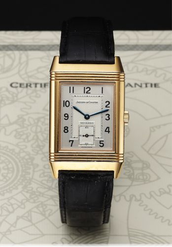 JAEGER-LECOULTRE REF. 270.2.62 REVERSO PINK GOLD.Jaeger-LeCoultre, Reverso, case No. 1737114, Ref. 270.2.62. Made.in 1999, sold February 25th, 2000..Fine, rectangular, reversible, 18k pink gold wristwatch with an 18k.pink gold Jaeger- LeCoultre buckle. Ac