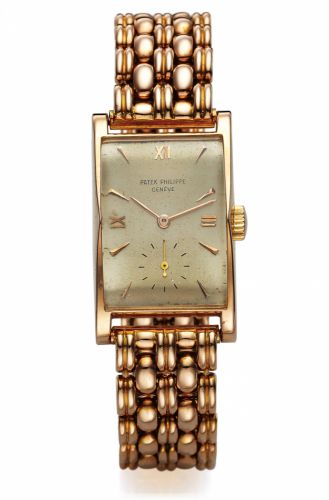 PATEK PHILIPPE REF. 1588 PINK GOLD.Patek Philippe & Co, Genève, No. 972839, case No. 661359.Ref. 1588. Made circa 1945..Very fine and rare, rectangular, 18K pink gold wristwatch with an.18K pink gold fancy GF link bracelet. Accompanied by a box and.invoic