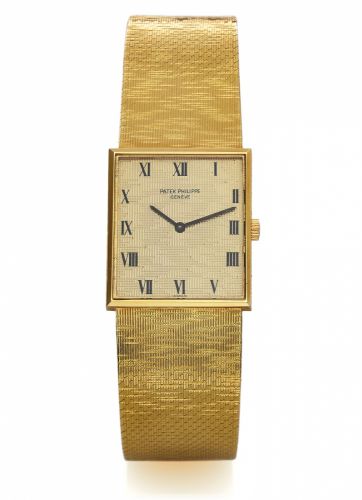PATEK PHILIPPE REF. 3550 YELLOW GOLD.Patek Philippe & Cie, Genève, No. 1168263, case No. 2691446.Ref. 3550/1. Made circa 1970..Fine, rectangular, thin, 18K yellow gold wristwatch with an 18K yellow.gold textured Patek Philippe mesh bracelet.