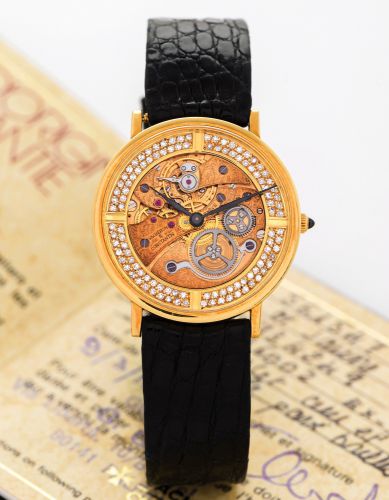 VACHERON CONSTANTIN SKELETONIZED.YELLOW GOLD.DIAMONDS.Vacheron Constantin, Genève, No. 734249, case No. 561547.Ref. 36002. Sold on March 3rd, 1985..Very fine and rare, thin, skeletonized, 18K yellow gold and.diamond-set wristwatch with an 18K yellow gold 