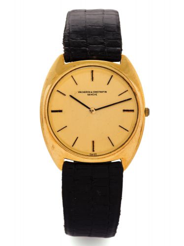 VACHERON & CONSTANTIN REF. 7595.Vacheron & Constantin, Genève, movement No. 620623.Ref. 7595. Made in the 1970s..Very fine and unusual, thin, tonneau-shaped.self-winding, 18K yellow gold wristwatch..Dial, case and movement signed.