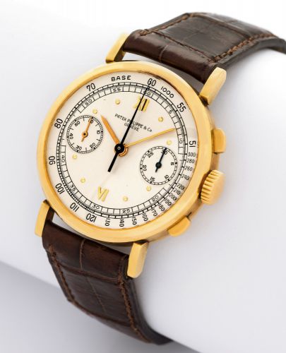 PATEK PHILIPPE REF 591 CHRONOGRAPH.Patek Philippe & Co, Genève, movement No. 862470, case No. 621704, Ref. 591. Made in 1940 and sold.on November 4th, 1940..Very fine and rare 18K yellow gold wristwatch with square button chronograph, register, tachometer
