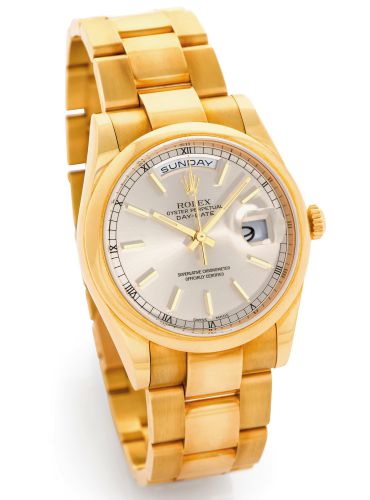ROLEX DAY-DATE.Rolex, Oyster Perpetual, Day-Date, Superlative.Chronometer, Officially Certified, case No. P580423, Ref. 118208. Made circa 2000..Very fine, center seconds, self-winding, water-resistant.18K yellow gold Chronometer wristwatch with day.date 