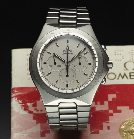 OMEGA REF. 1450040 SPEEDMASTER STEEL.Omega, Speedmaster, No. 44121003, case No. 3450803, Ref. 1450040. Made in the 1980s..Fine, tonneau-shaped, water-resistant, stainless steel wristwatch with round button chronograph, registers, tachometer and.a stainles