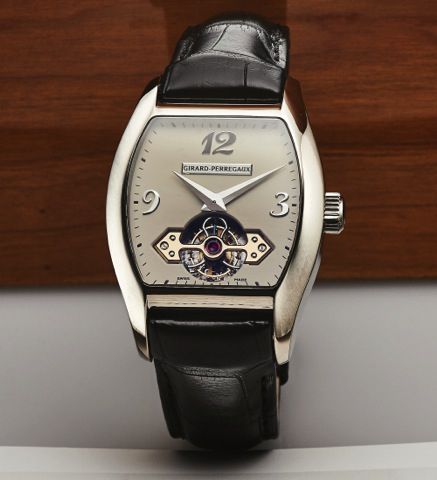 GIRARD-PERREGAUX RICHEVILLE TOURBILLON.SOUS UN PONT D'OR WHITE GOLD.Girard-Perregaux, No. 1 OG, Ref. 9931. Made in 2005..Very fine and rare, large, tonneau-shaped, self-winding, 18K.white gold wristwatch with visible one-minute tourbillon.regulator under 