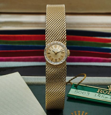 ROLEX REF. 5003 CHAMELEON YELLOW GOLD.Rolex, Chameleon, case No. 93826, Ref. 5003. Made circa 1973..Fine and unusual, 14K yellow gold lady's wristwatch with 14K.yellow gold Rolex bracelet. Case featuring a double bottomed.back for insertion of straps or b