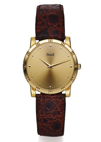 PIAGET REF. 84023N QUARTZ YELLOW GOLD.Piaget, Quartz, case No. 661216, Ref. 84023 N. Made in.the 1990's..Fine, 18K yellow gold quartz wristwatch with an 18K.yellow gold Piaget buckle..Dial, case and movement signed.