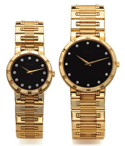 PIAGET, SET OF 2 DANCER YELLOW GOLD.Piaget. Made in the late 1980's. A set of matching his.and hers 18K yellow gold quartz wristwatches with an.integrated 18K yellow gold Piaget bracelet. Accompanied.by the original fitted box and instruction booklet..A) 