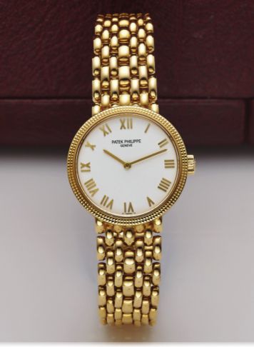 PATEK PHILIPPE REF 4809.LADY'S CALATRAVA YELLOW GOLD.Patek Philippe, Genève, Calatrava, No. 3072945, case No..4149091, Ref. 4809J- 002..Very fine, 18K yellow gold lady's wristwatch with an 18K.yellow gold Patek Philippe bracelet. Accompanied by a Patek.Ph