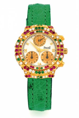PIAGET, REF. 14071 TANAGRA GOLD.DIAMONDS, RUBIES & EMERALDS.Piaget, Genève, Tanagra, Haute Complication.No. 585802, Ref. 14071. Made in the 1990s..Fine, 18K yellow gold, diamond, ruby and emerald-set.lady's quartz wristwatch with round button chronograph.