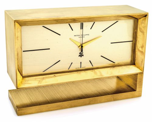 PATEK PHILIPPE QUARTZ.ELECTRONIC TABLE CLOCK.Patek Philippe, Genève, Pendulette de Table, No..1800087, Ref. 1160. Made specially for la Société de.Banque Suisse (SBS) in 1973, sold on August 31st, 1973..Very fine and very rare, gilt brass, electronic quar