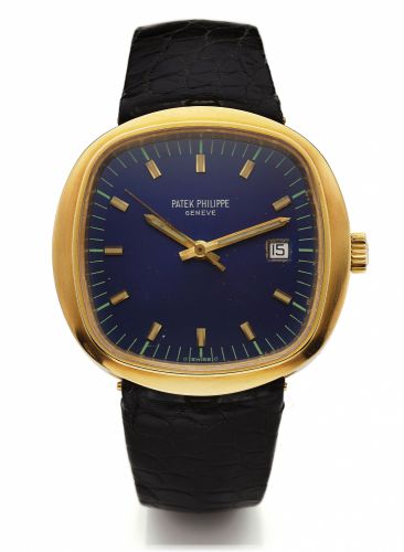 PATEK PHILIPPE REF. 3597/2 BETA 21.DETACHABLE BRACELET YELLOW GOLD.Patek Philippe, Genève, No. 00006101, case No. 2720560.Ref. 3597/2. Made in 1973, sold on July 9th, 1973..Rare and unusual center second, water-resistant, large.cushion-shaped, 18K yellow 