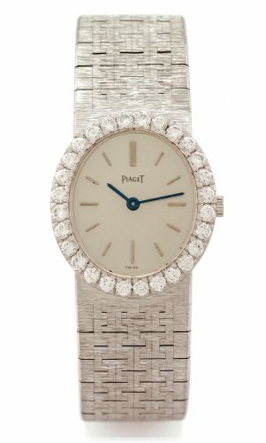 PIAGET REF. 9814, FOR HERMES.WHITE GOLD.DIAMONDS.Piaget, case No. 117901, Ref. 9814 A6. Made in the 1990s..Very fine and elegant, 18K white gold and diamond-set.wristwatch with an integral 18K white gold textured.Piaget bracelet..Dial, case and movement s
