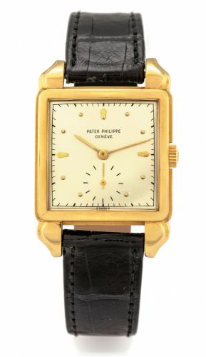 PATEK PHILIPPE REF. 2424.SQUARE FLAME YELLOW GOLD.Patek Philippe, Genève, movement No. 952592, case No..652045, Ref. 2424. Made in 1949, sold on October 19th, 1949..Fine and rare, square, 18K yellow gold wristwatch with an.18K yellow gold Patek Philippe b