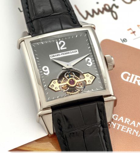 GIRARD-PERREGAUX REF. 9985 VINTAGE TOURBILLON SOUS UN PONT D'OR WHITE GOLD.Girard-Perregaux, Tourbillon Automatique, No. 14 OG, Ref. 9985. Sold on December 7th, 2006..Very fine and rare, large, rectangular curved, self-winding, 18K white gold wristwatch w