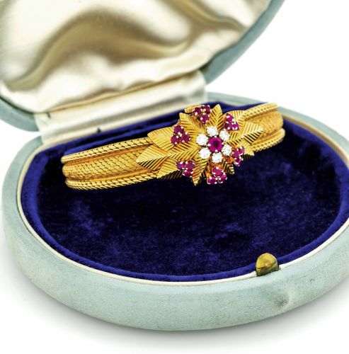 PATEK PHILIPPE REF. 3205 FLOWER BRACELET.WATCH YELLOW GOLD.DIAMOND & RUBY.Patek Philippe, Genève, movement No. 949506, case No..697896, Ref. 3205/58. Made in 1958, sold on June 30th, 1961..Very fine and rare, lady's 18K yellow gold, diamond and.ruby-set w