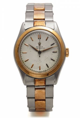 ROLEX, REF. 6108 SEMI BUBBLE BACK.Rolex, Oyster Perpetual, Chronometer, case No. 803907.Ref. 6108. Made circa 1962..Fine and rare, tonneau-shaped, center seconds, self-.winding, water-resistant, stainless steel and yellow gold.wristwatch with a stainless 