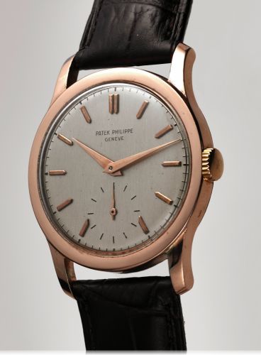 PATEK PHILIPPE REF. 2449 PINK GOLD.Patek Philippe, Geneve, No. 966246, case No. 659047, Ref. 2449. Made in 1950, sold on February 6th, 1952..Very fine and rare, large, 18K pink gold wristwatch..Accompanied by the Extract from the Archives.