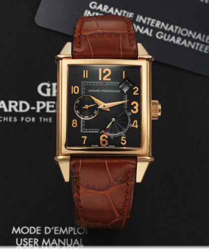 GIRARD-PERREGAUX REF. 2585 VINTAGE PINK GOLD.Girard-Perregaux, Vintage Power Reserve, Automatic.No. 1100, Ref. 2585. Made circa 2007..Fine, rectangular curved, self-winding, water-resistant, 18K pink.gold wristwatch with 45-hour power reserve indicator, d